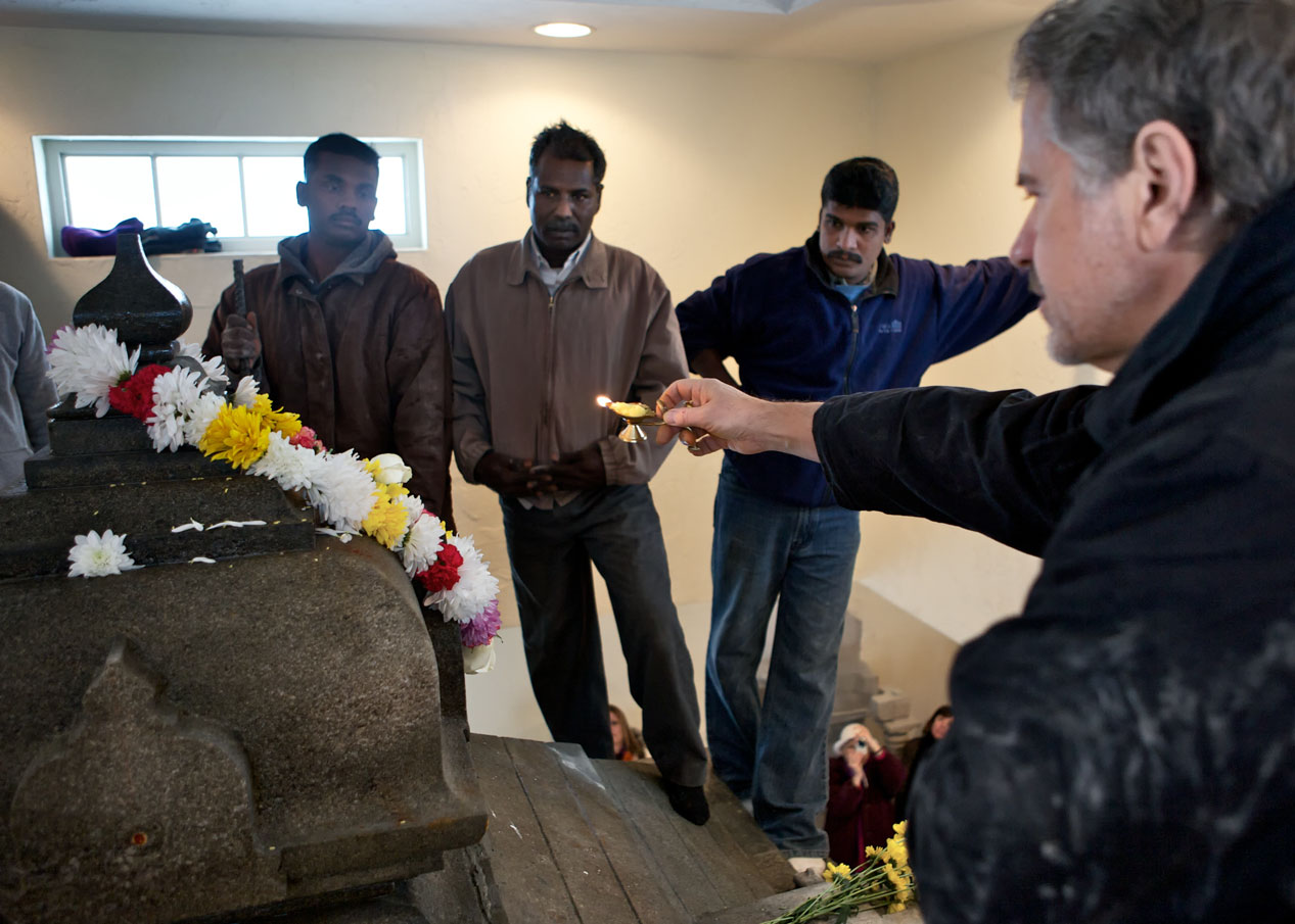 Michael performing Aarathi (offering light in a spirit of humility and gratitude).
